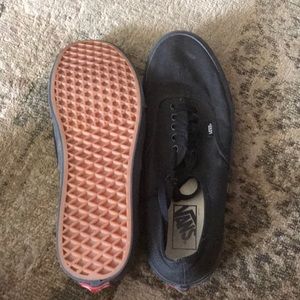 Men’s black pair of vans